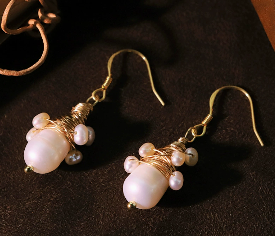 Vintage parel oorbellen met gouden draden