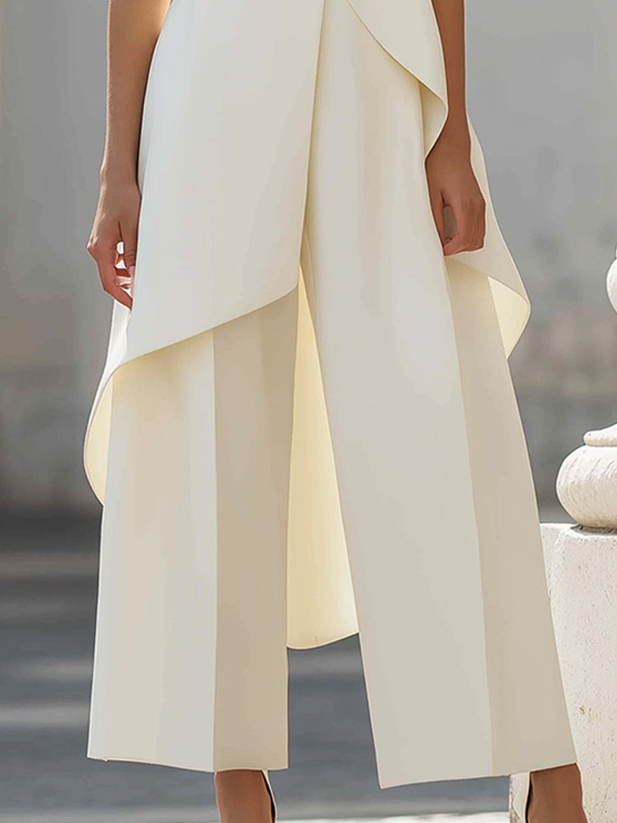 Dovessa - Dames jumpsuit met hoge kraag en asymmetrisch paneel