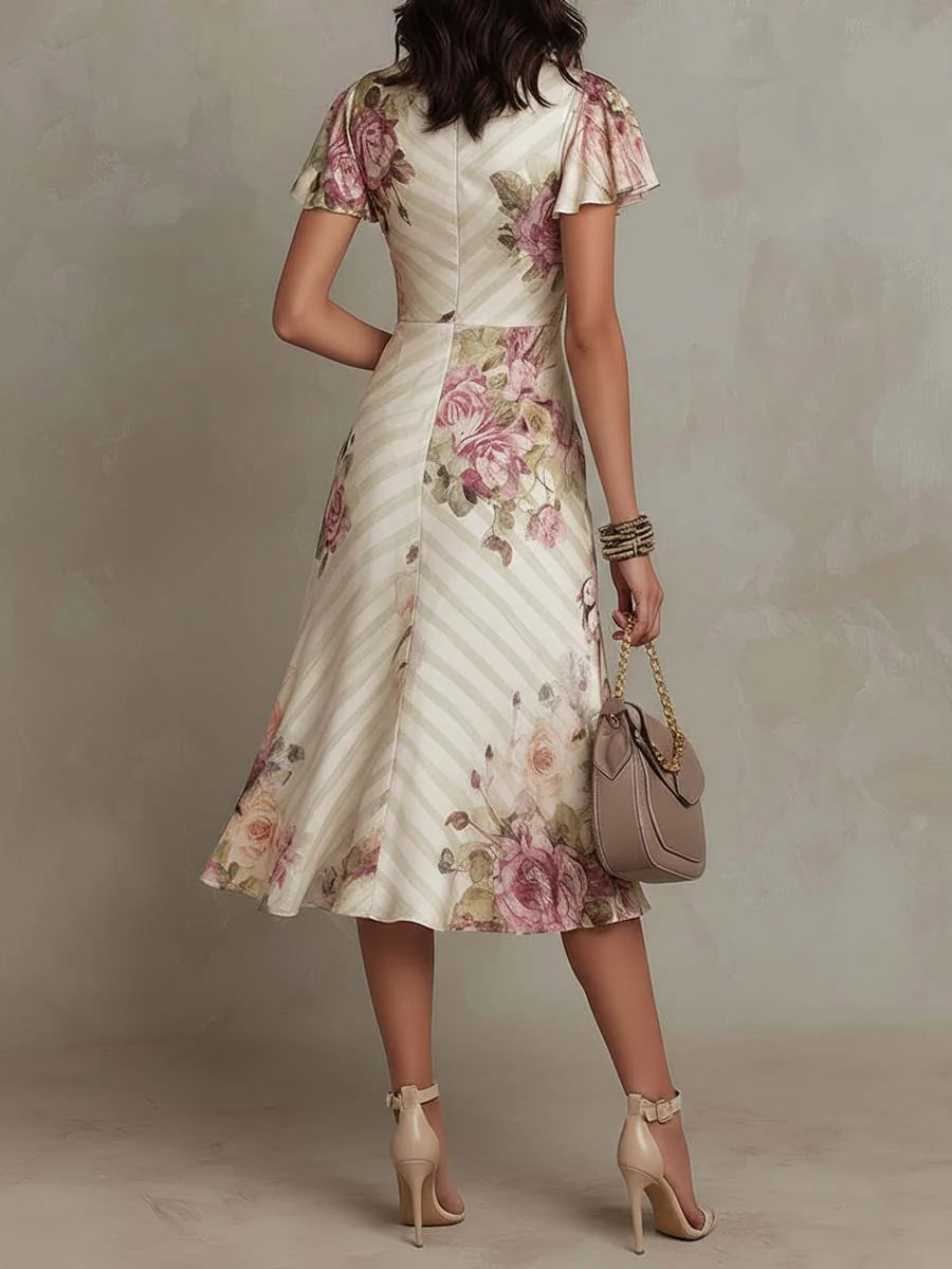 Eliana | Elegante midi-jurk met retrobloemenprint